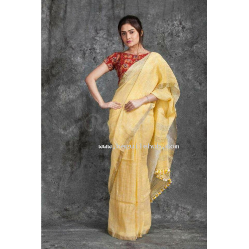 Yellow linen saree with silver border